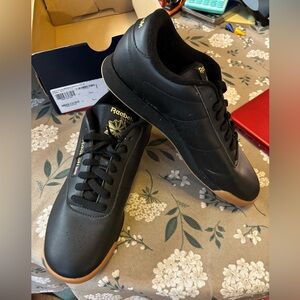 Reebok Princess Black (with tan bottoms) Sneakers. NIB 9.5 medium.